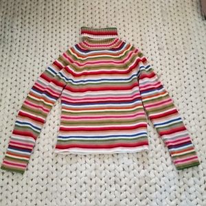 Rainbow-striped turtleneck